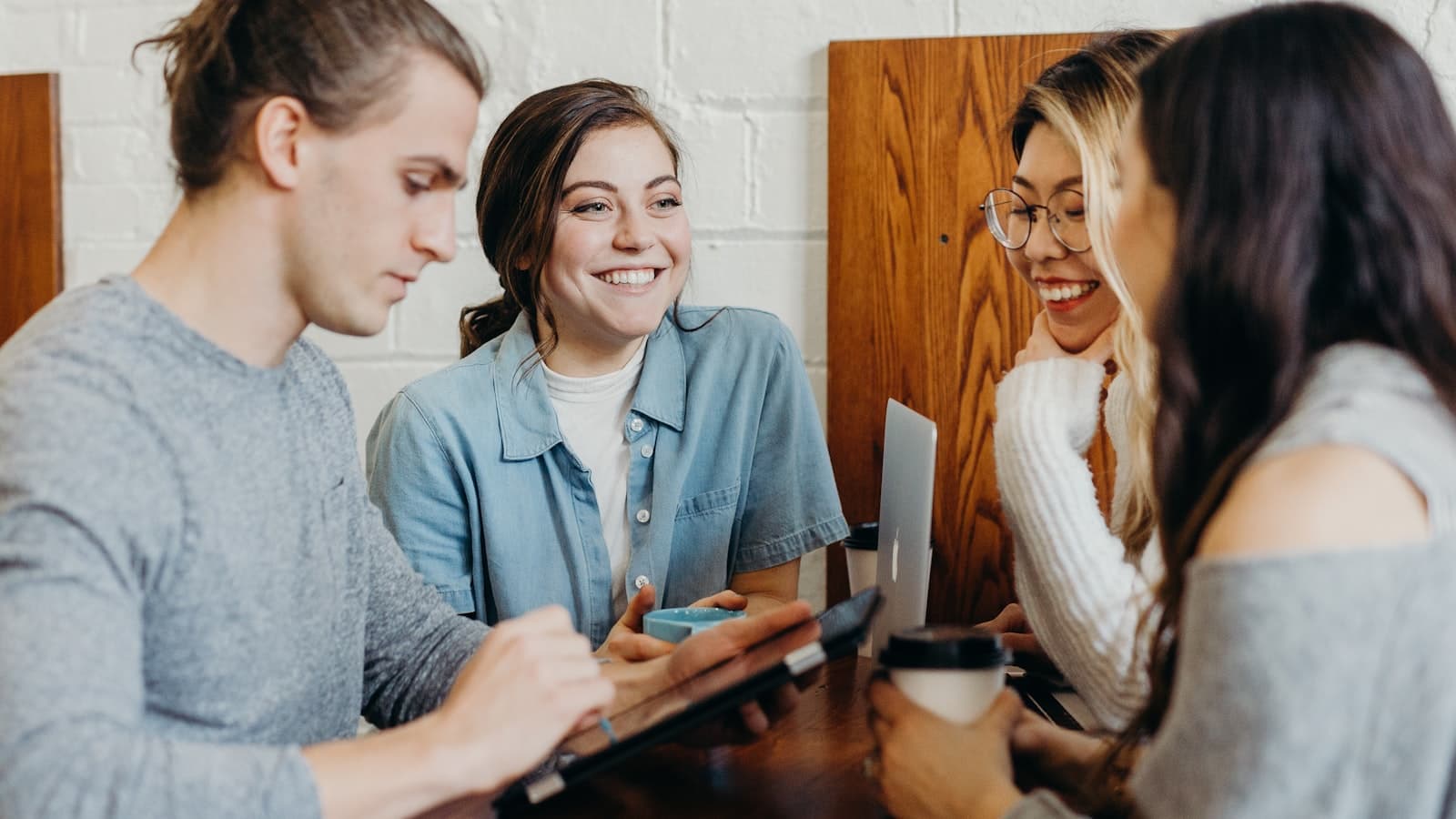 Friends talking around a table