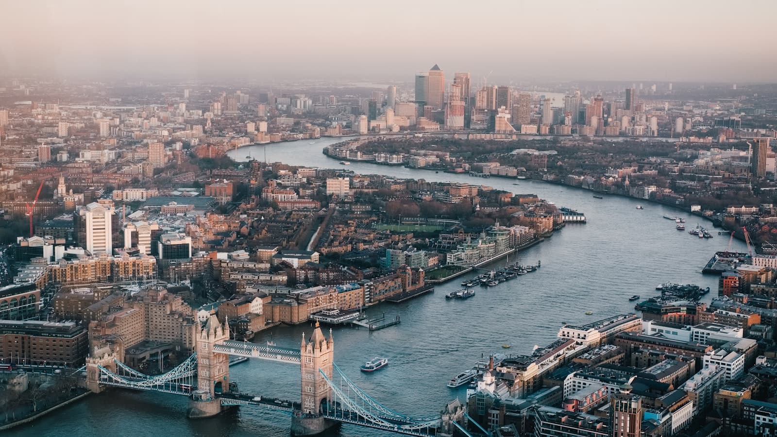 Aerial view of a city river at dusk